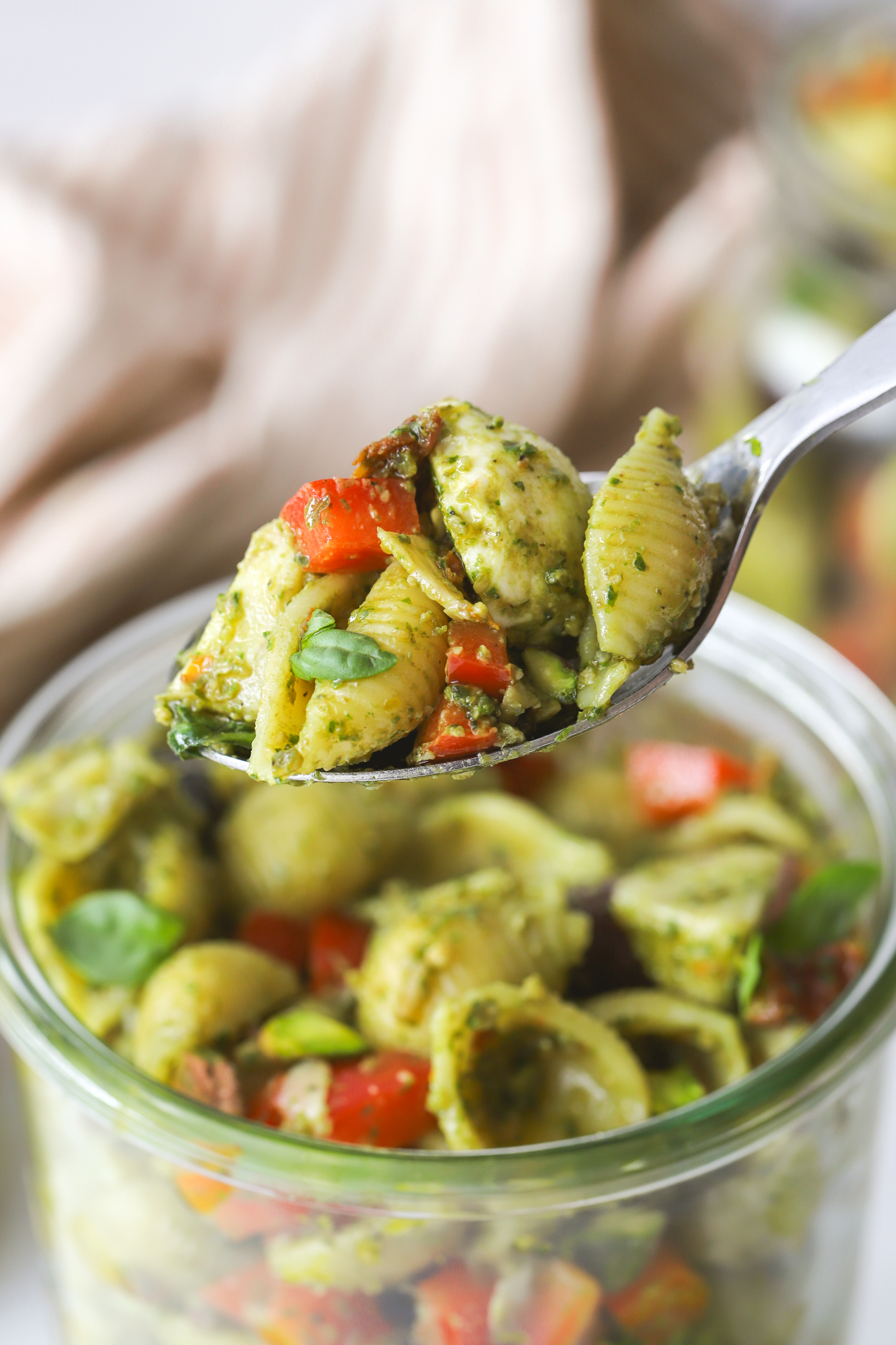 spoonful of pesto pasta salad