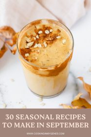 pumpkin smoothie in a glass with cinnamon garnish