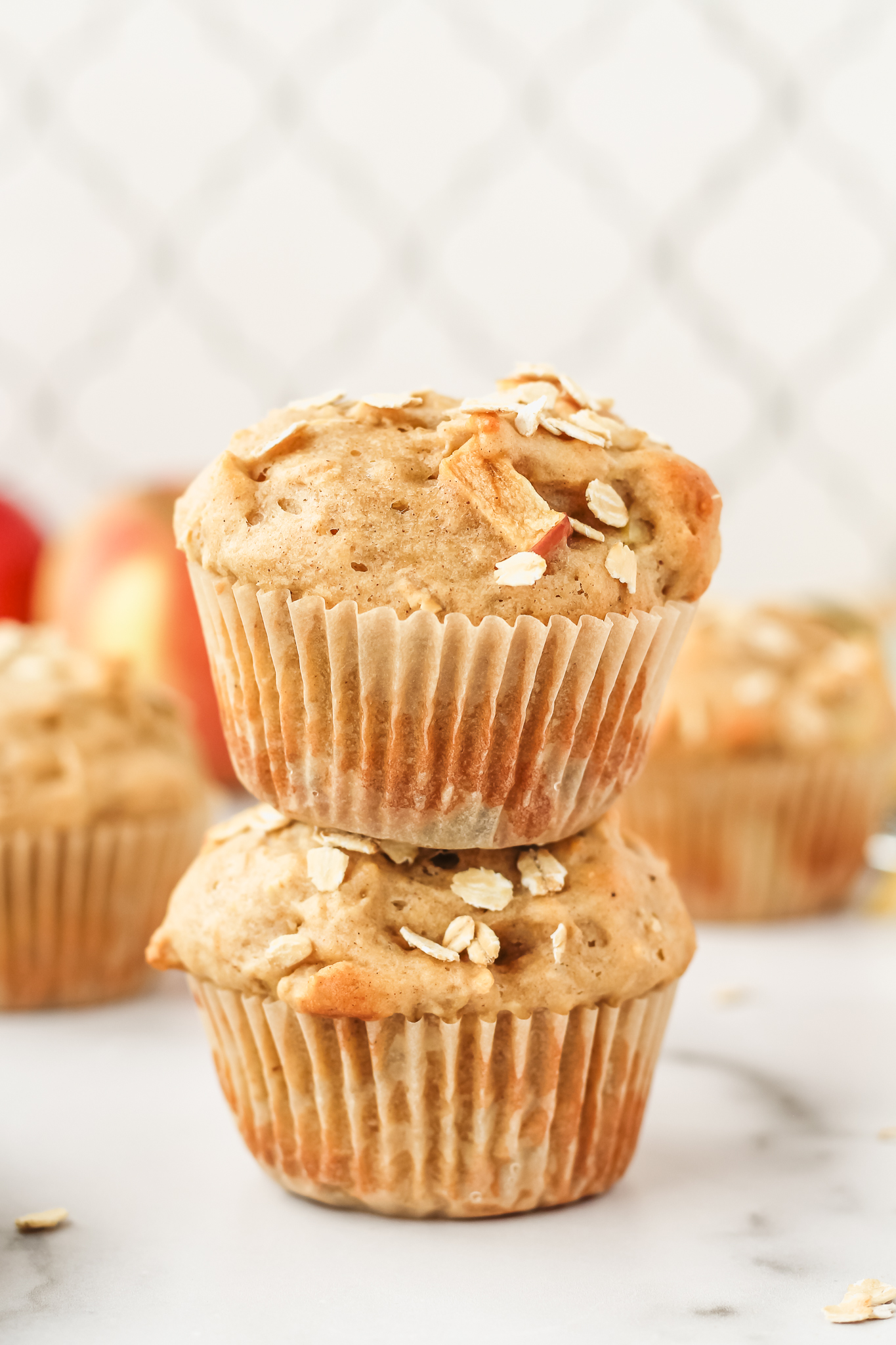 apple cinnamon oatmeal muffins in a stack