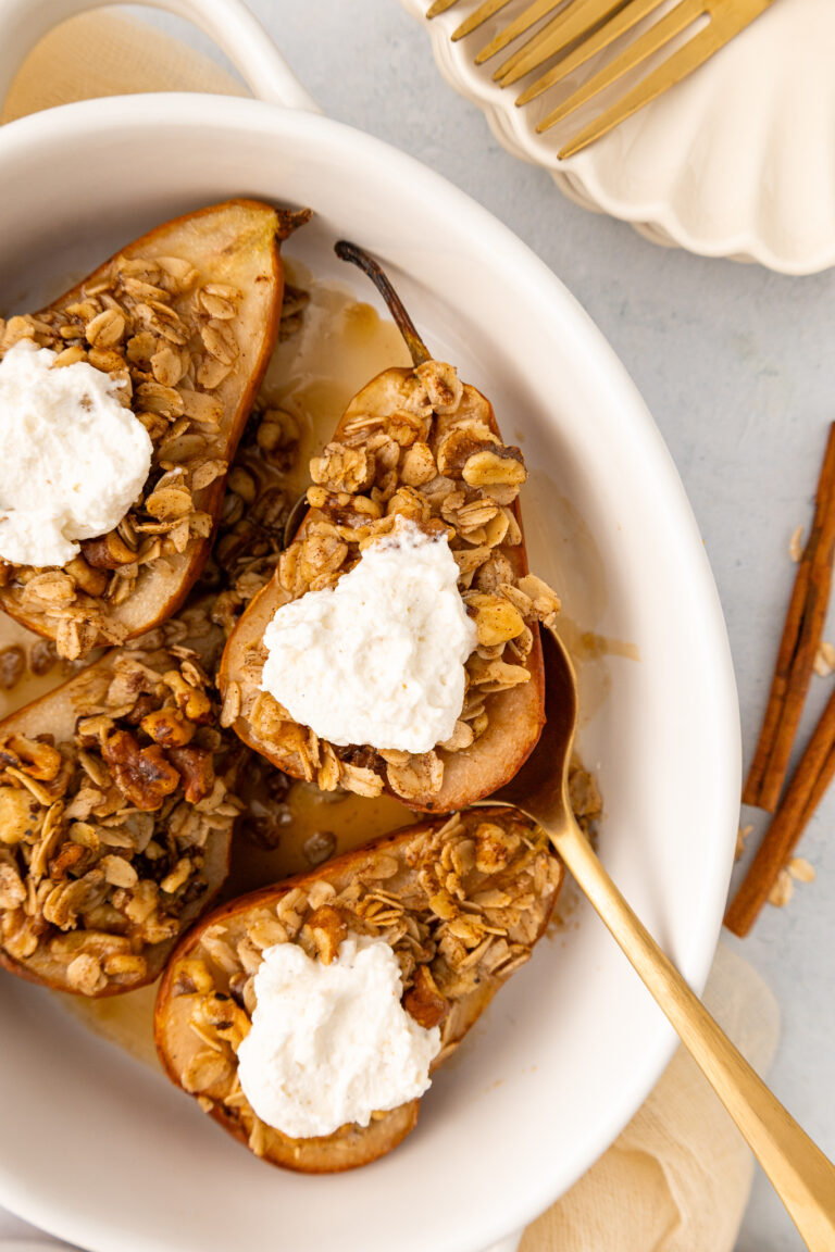 close up of baked pears in a baking dish