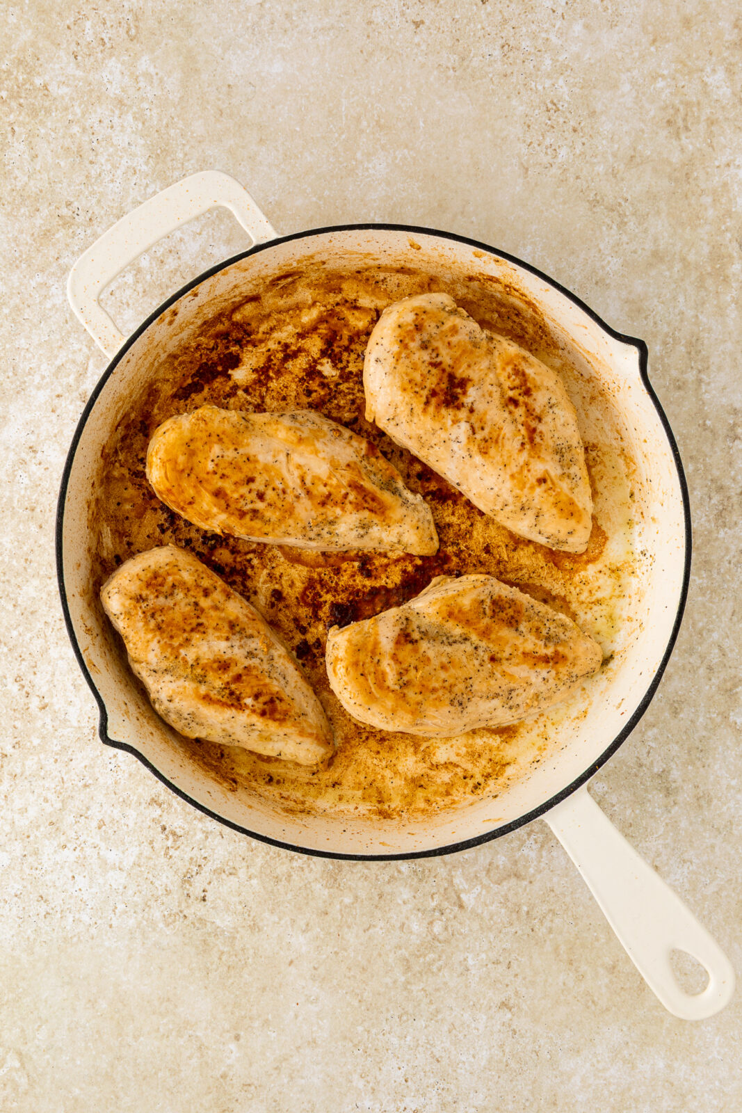 seared chicken breasts in a pan