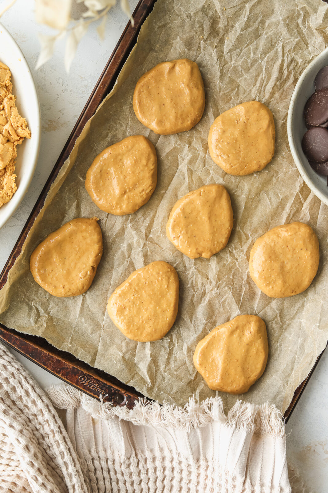Easter eggs being made on a baking sheet