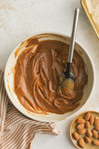 almond butter mixed in a bowl with maple syrup