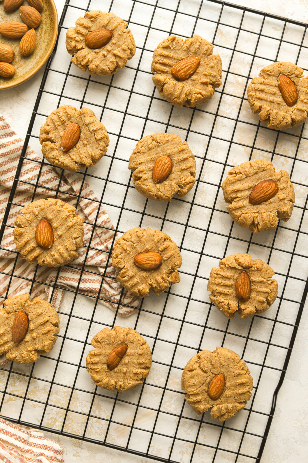 baked almond butter cookies on a cooling rack