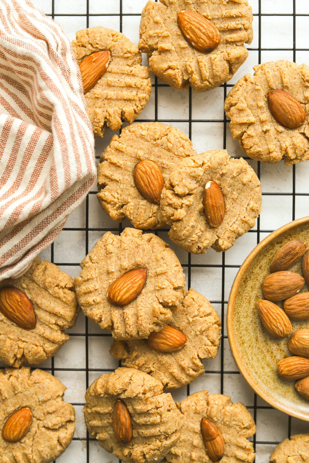 baked almond butter cookies on a cooling rack