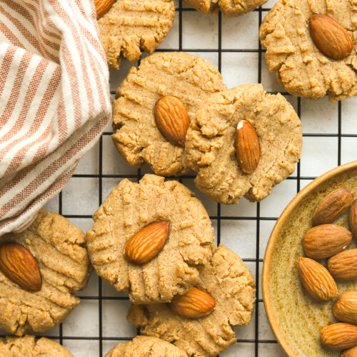baked almond butter cookies on a cooling rack