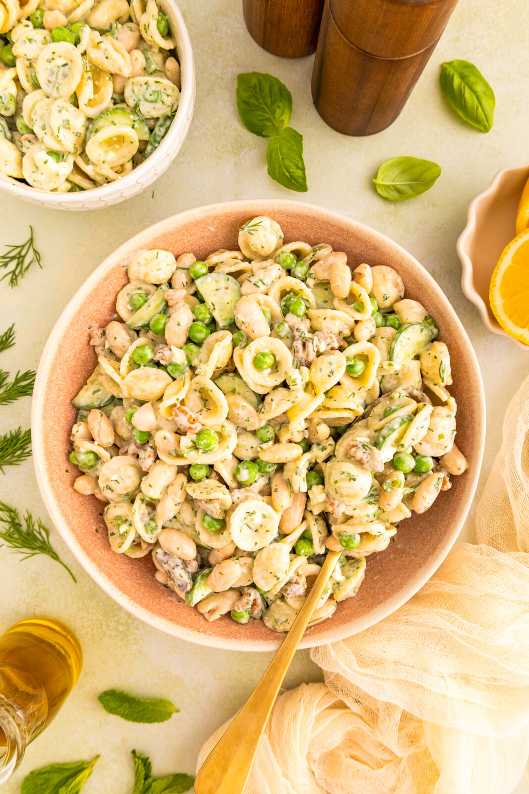 pasta salad with green goddess dressing in a large serving bowl