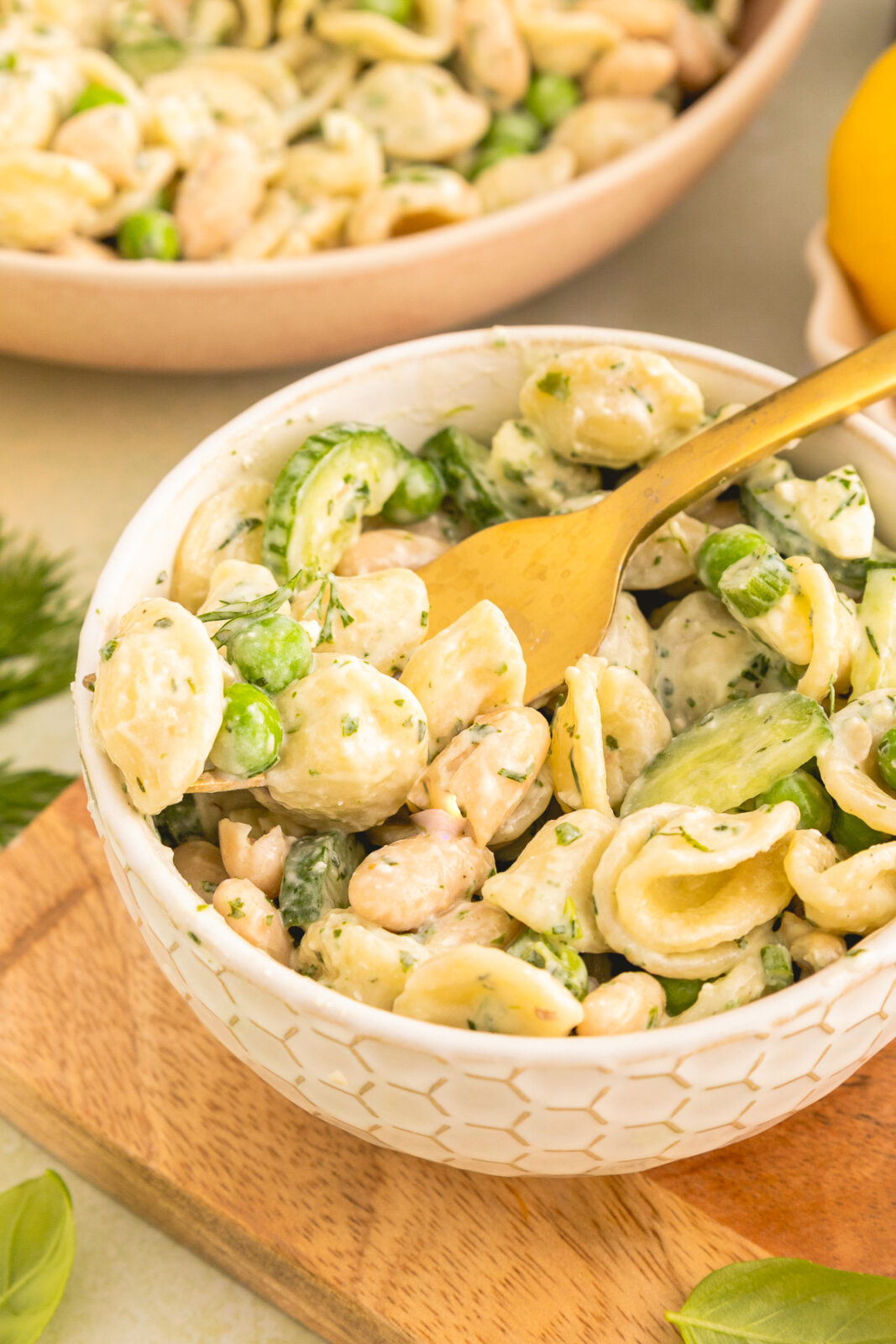 fork in a bowl of green goddess pasta salad