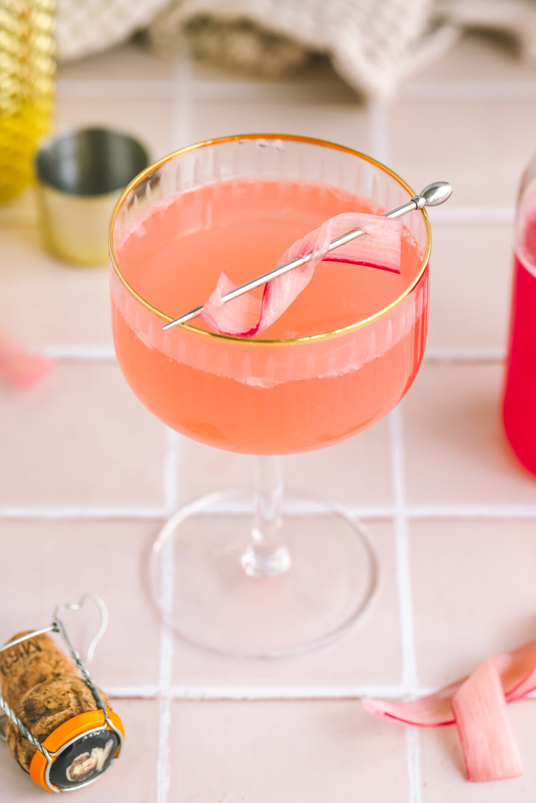 rhubarb french 75 cocktail using rhubarb simple syrup
