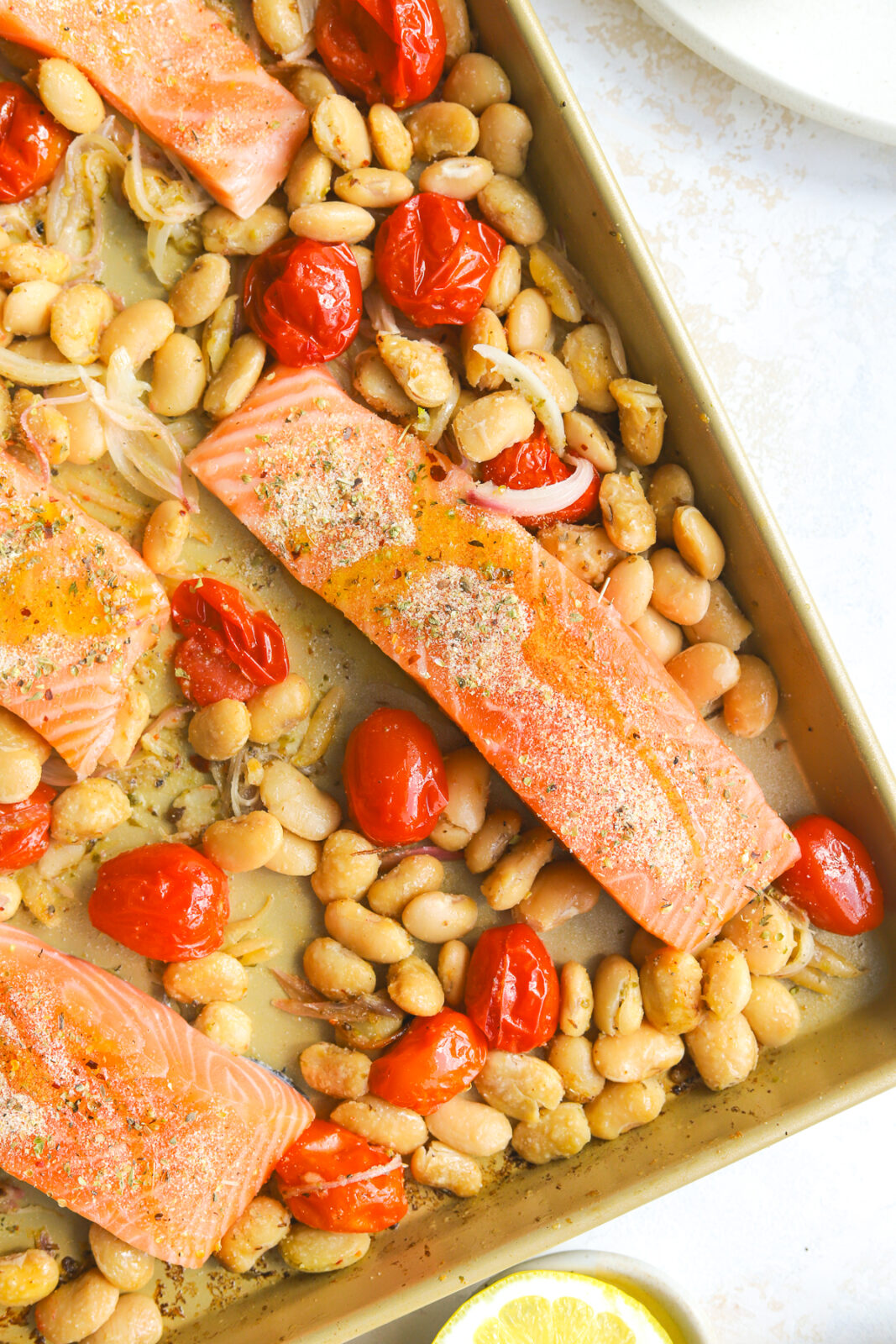 sheet pan salmon being prepared on a baking sheet