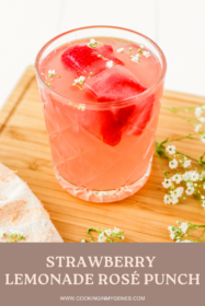 glass of strawberry rose lemonade cocktail