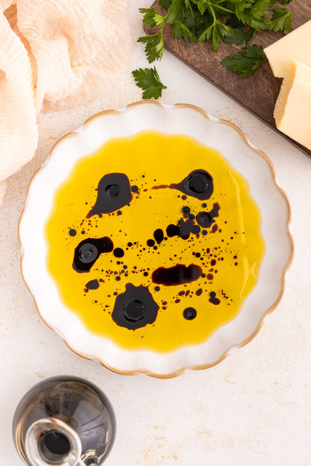 olive oil and balsamic vinegar in a white dish