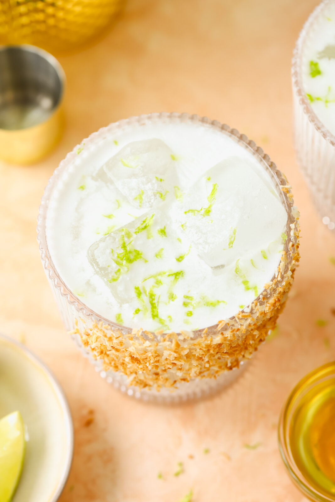 overhead photo of a coconut margarita on the rocks