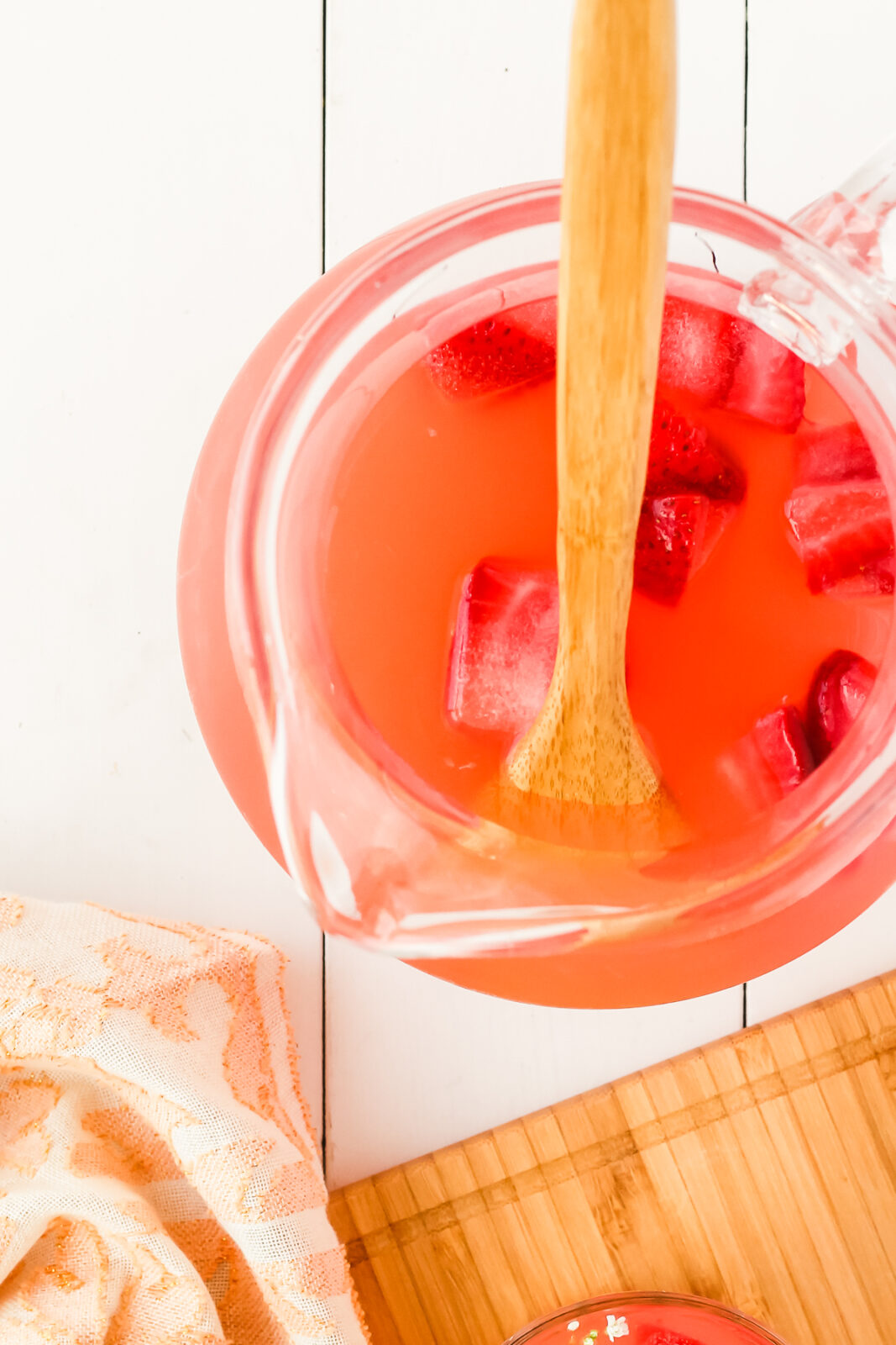 wooden spoon in a pitcher cocktail