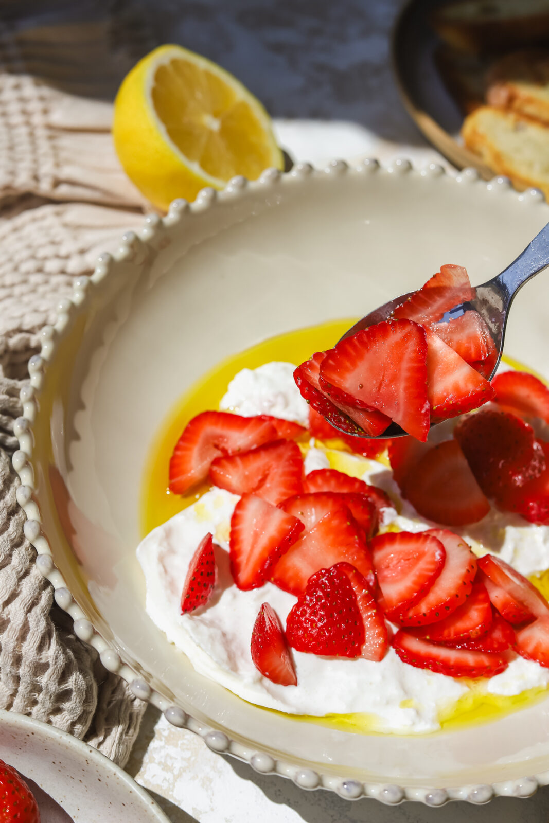spoon with sliced strawberries