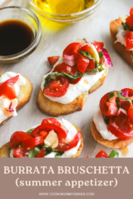 angled photo of bruschetta on crostini with burrata