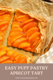 a piece of puff pastry apricot tart on a baking sheet