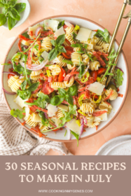 italian chopped pasta salad in a large bowl with serving spoons