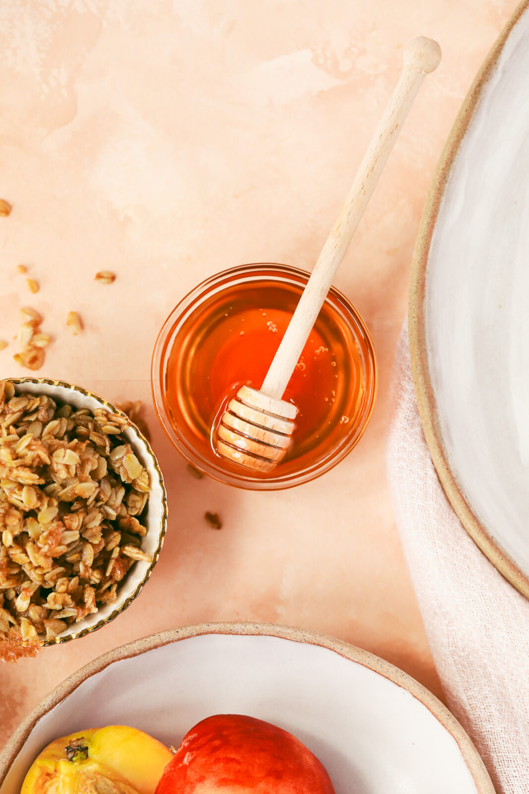 honey in a small bowl with honey drizzler