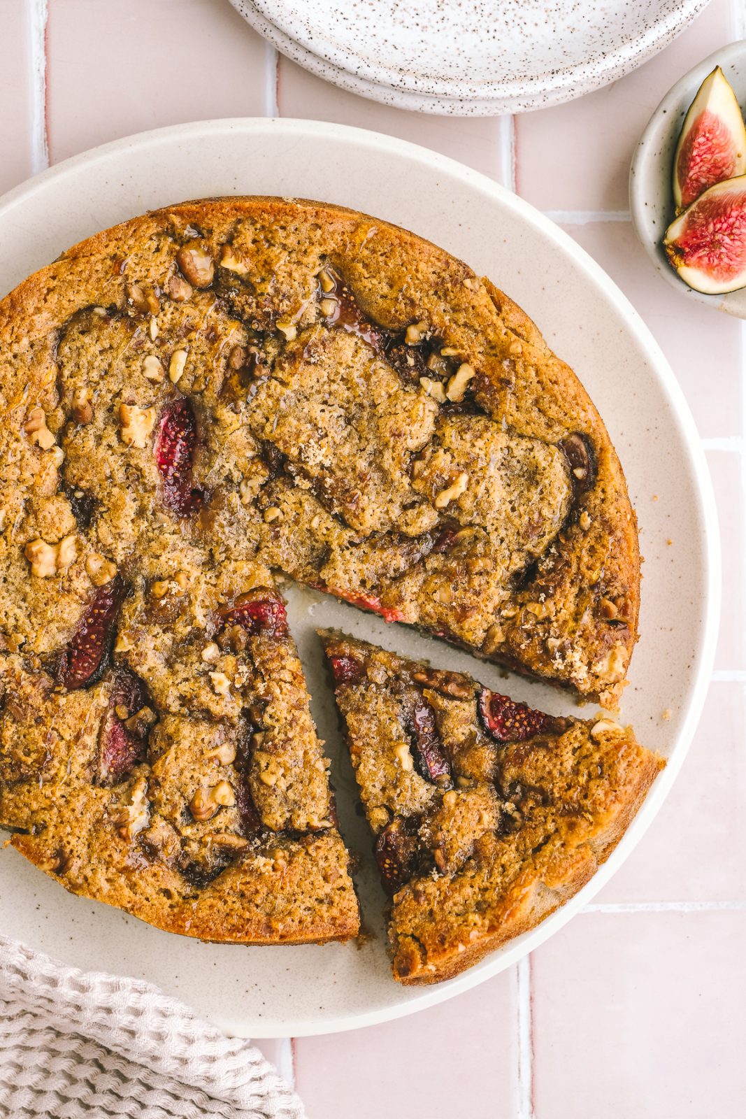 fig cake with a piece sliced