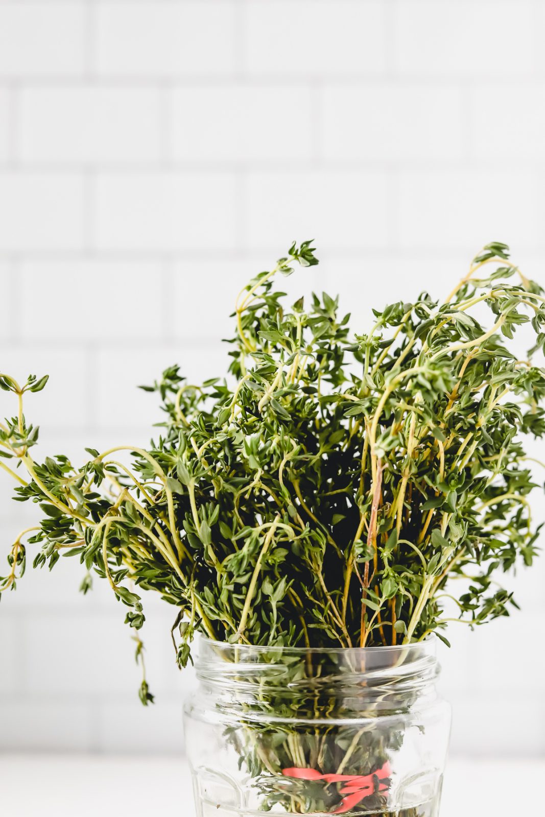 fresh herbs in a mason jar