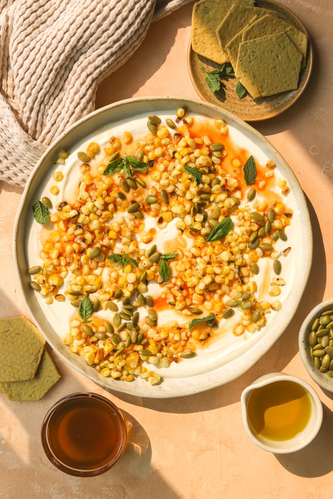 whipped feta with hot honey, corn and fresh herbs