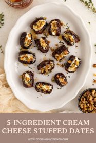 overhead photo of dates in a baking dish stuffed with cream cheese, topped with chopped walnuts, drizzled with honey and garnished with fresh thyme leaves