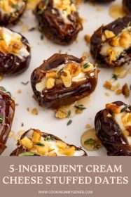 close up of dates stuffed with cream cheese, topped with chopped walnuts, drizzled with honey and garnished with fresh thyme leaves